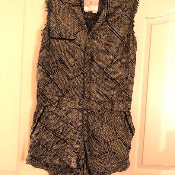 Hei Hei printed romper from Anthropologie. - Picture 2 of 7